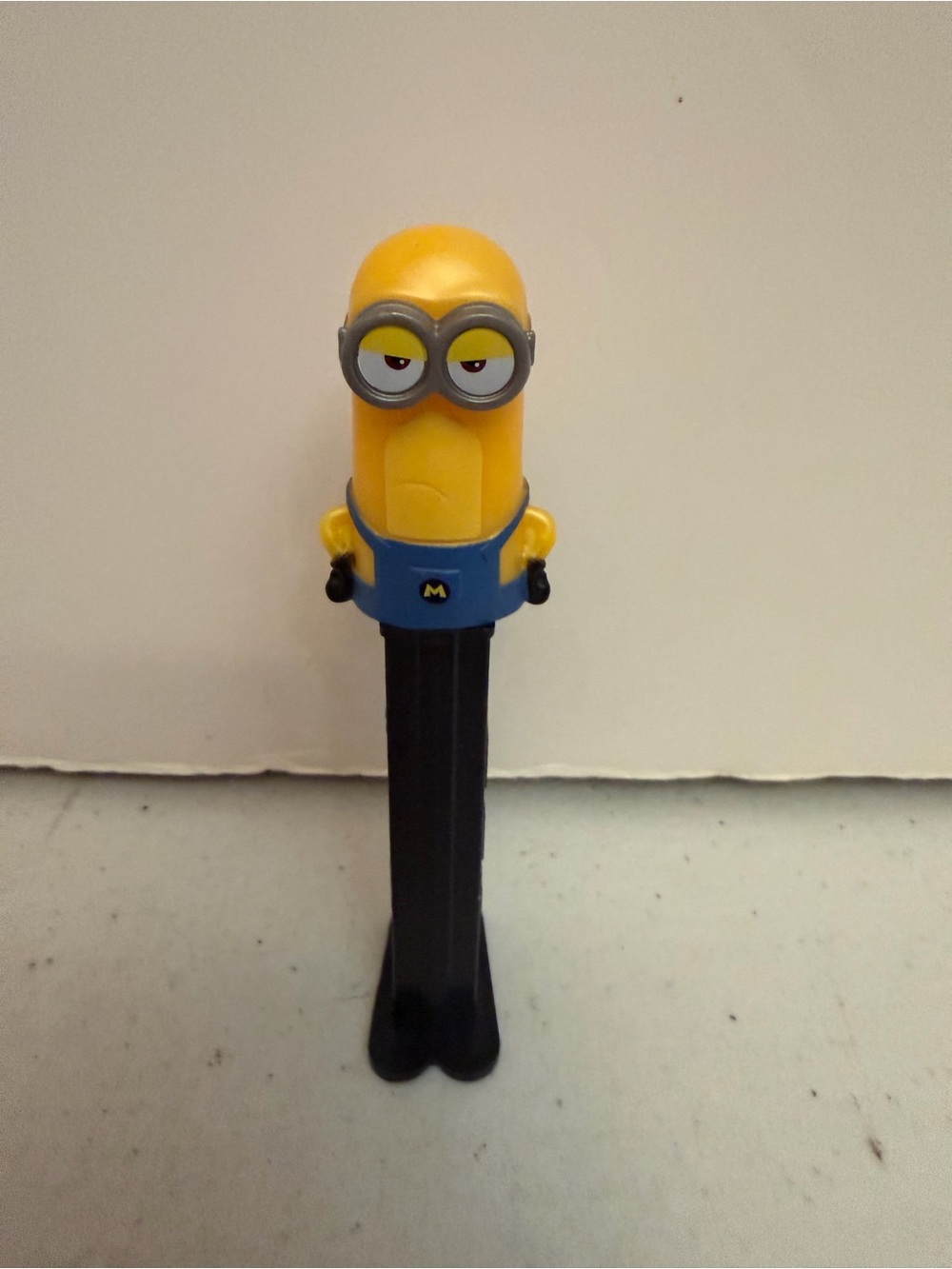 Yellow Minion Candy Dispenser with Blue Outfit